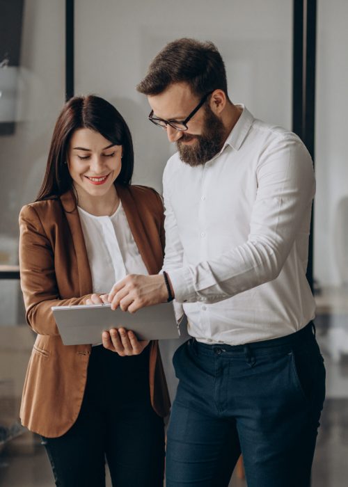 Two business partners working in office